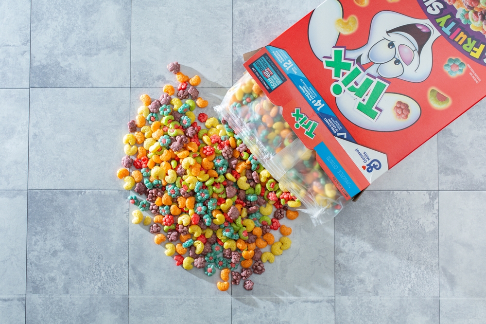 Los Angeles, California, United States - 01-01-2025: A top down view of a pile of Trix cereal spilling out of the package.