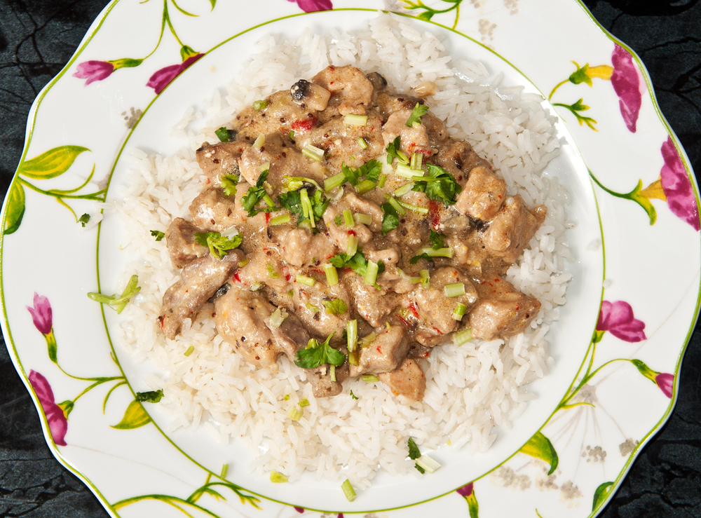 Creamy pork stroganoff stew with white rice