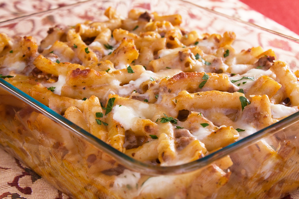 Baked ziti pasta with meat, tomato sauce, mozzarella, parmesan, and ricotta cheese.