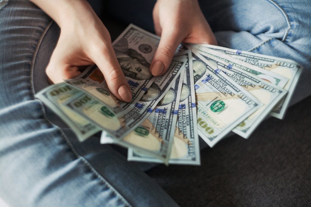 fan of 100 U.S. dollar banknotes
