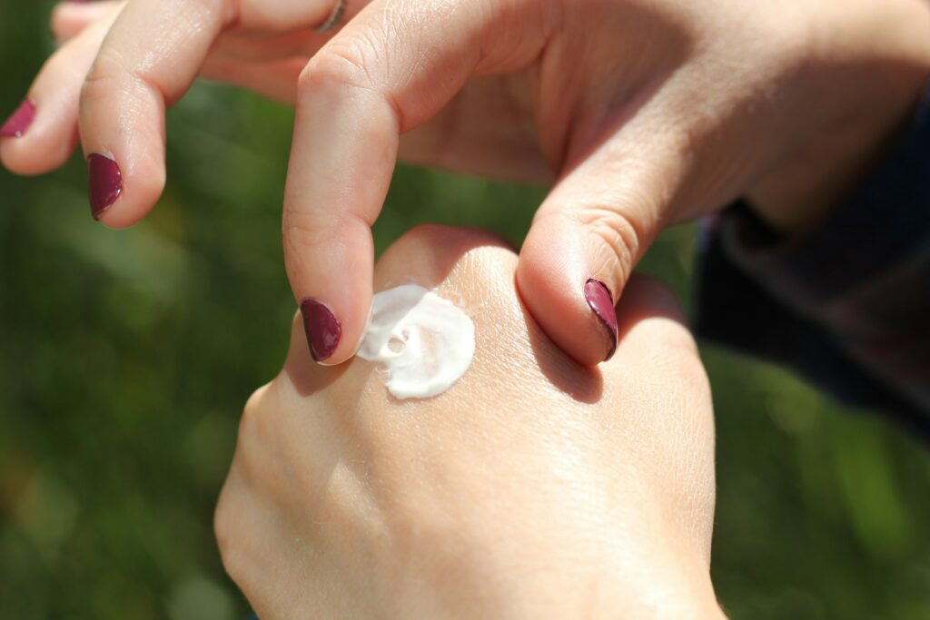 person with white nail polish
