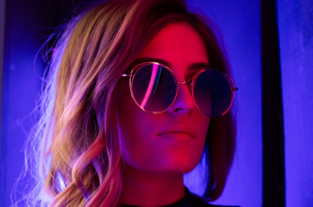 woman in silver framed aviator style sunglasses
