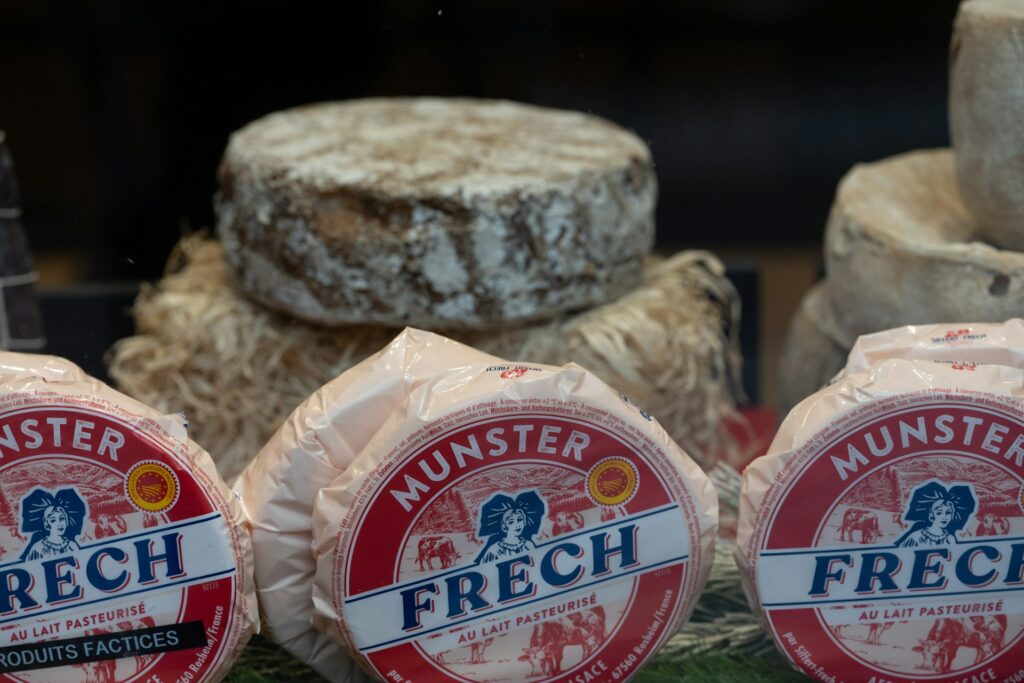 Cheeses are displayed, including munster frech.
