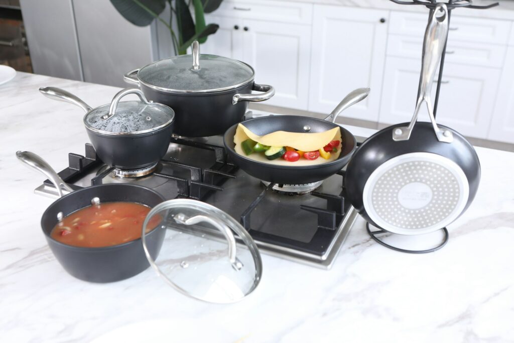 stainless steel cooking pots on stove
