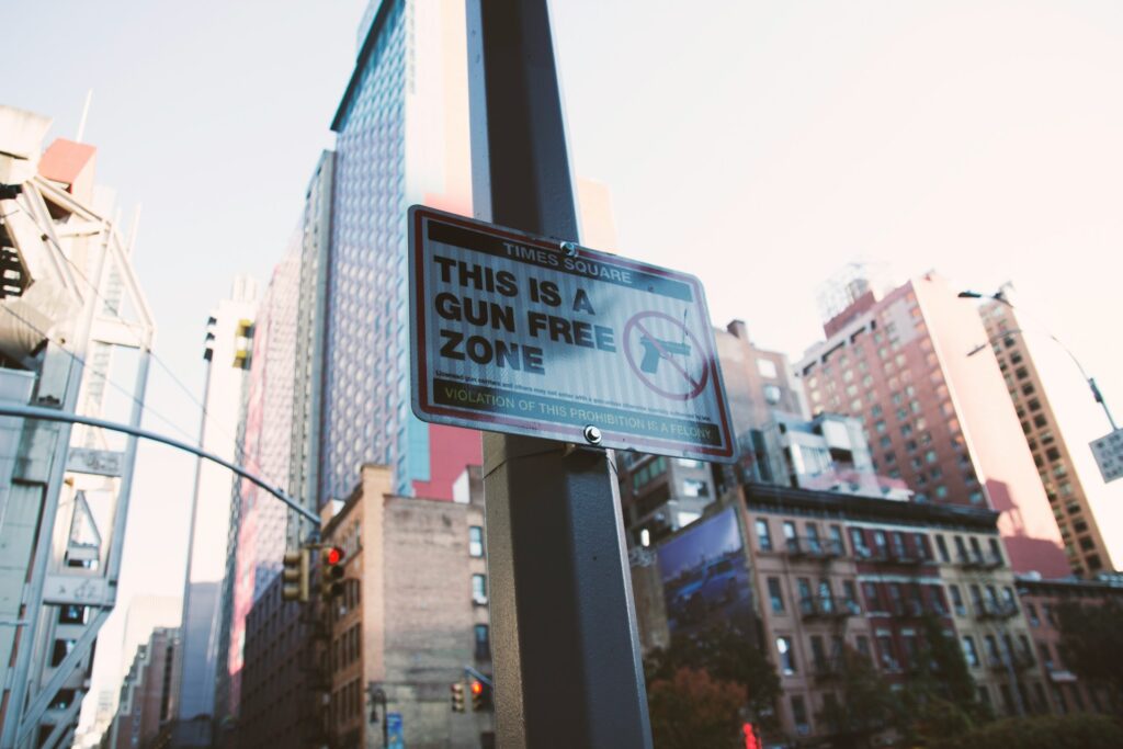 this is a gun free zone sign in a city
