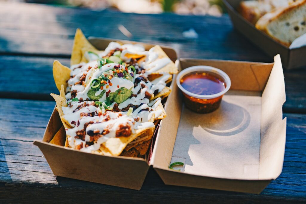brown and green food on brown carton box
