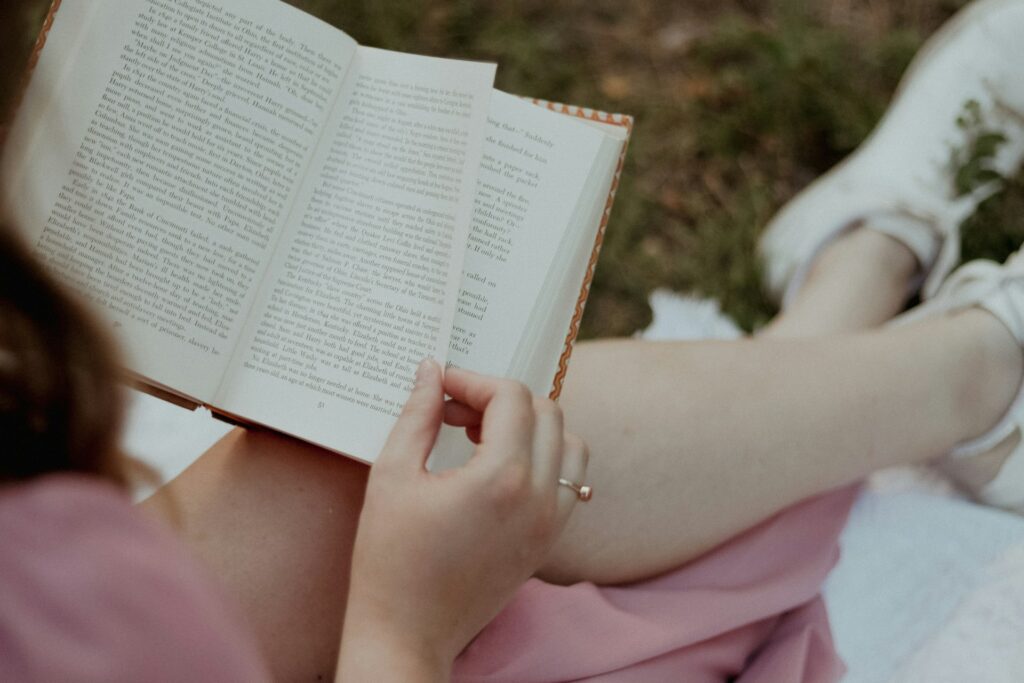a woman reading a book
