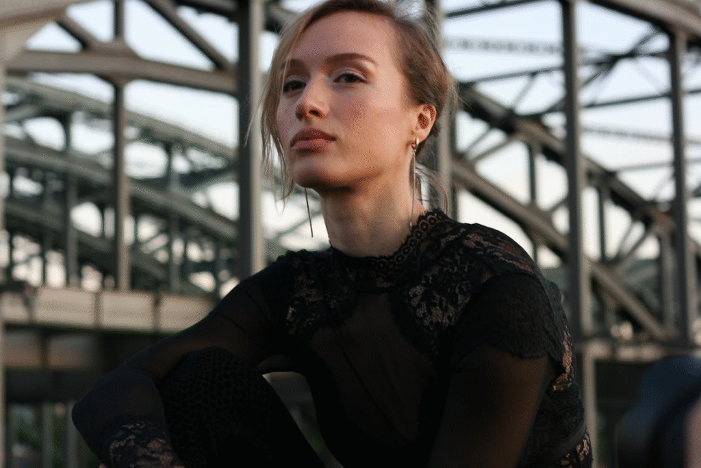 Confident Portrait of Woman in Industrial Setting