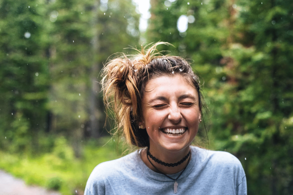 girl smiling woods