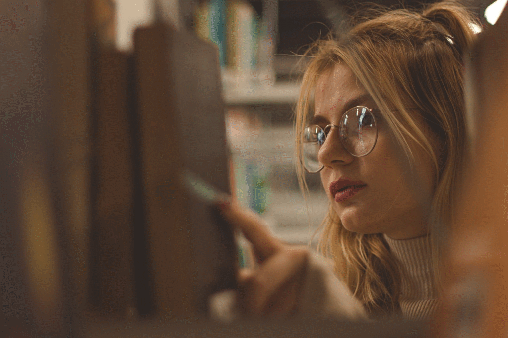 woman looking at books