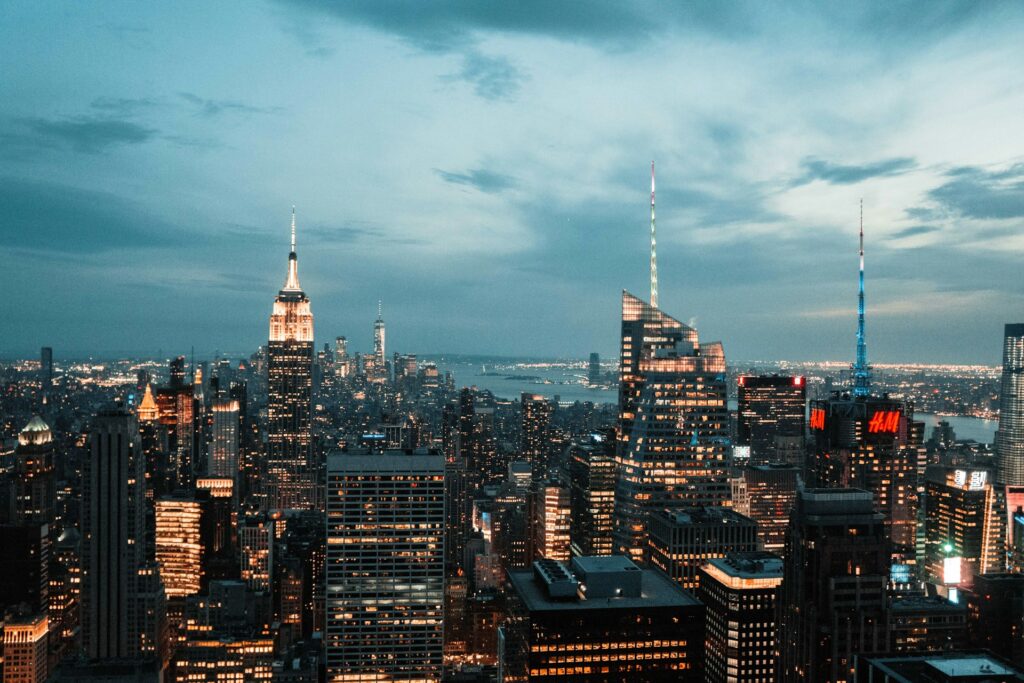 aerial photography of concrete high rise building under cloudy sky
