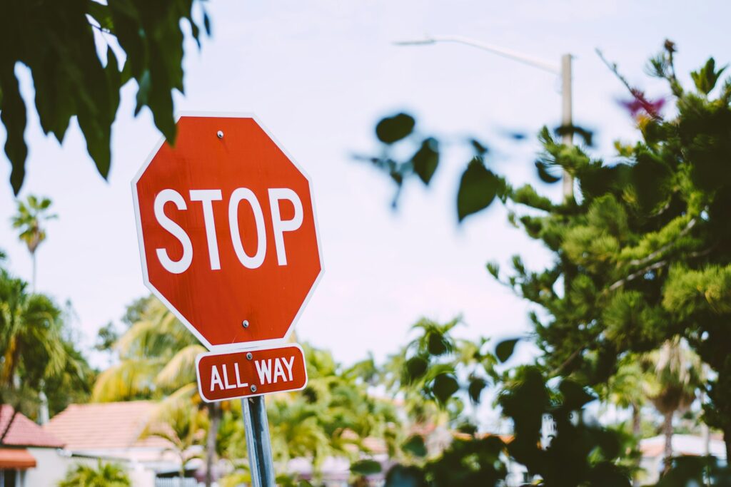 red stop road sign during daytime
