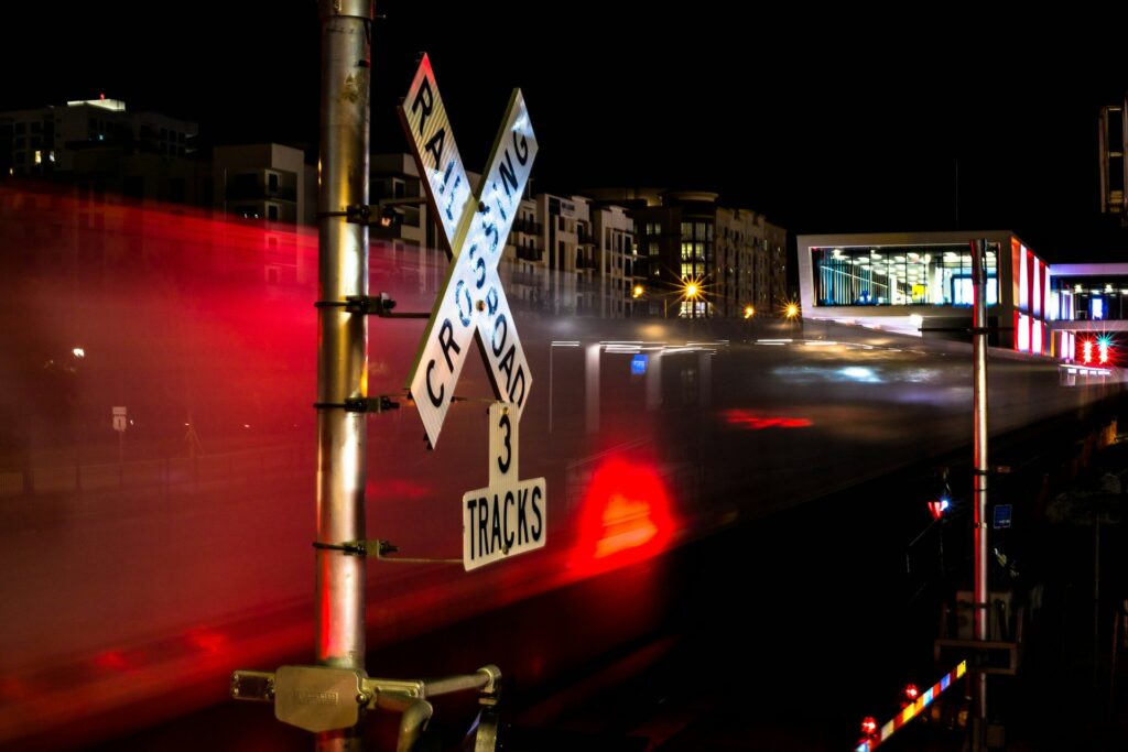 time lapse photo of crossing railroad
