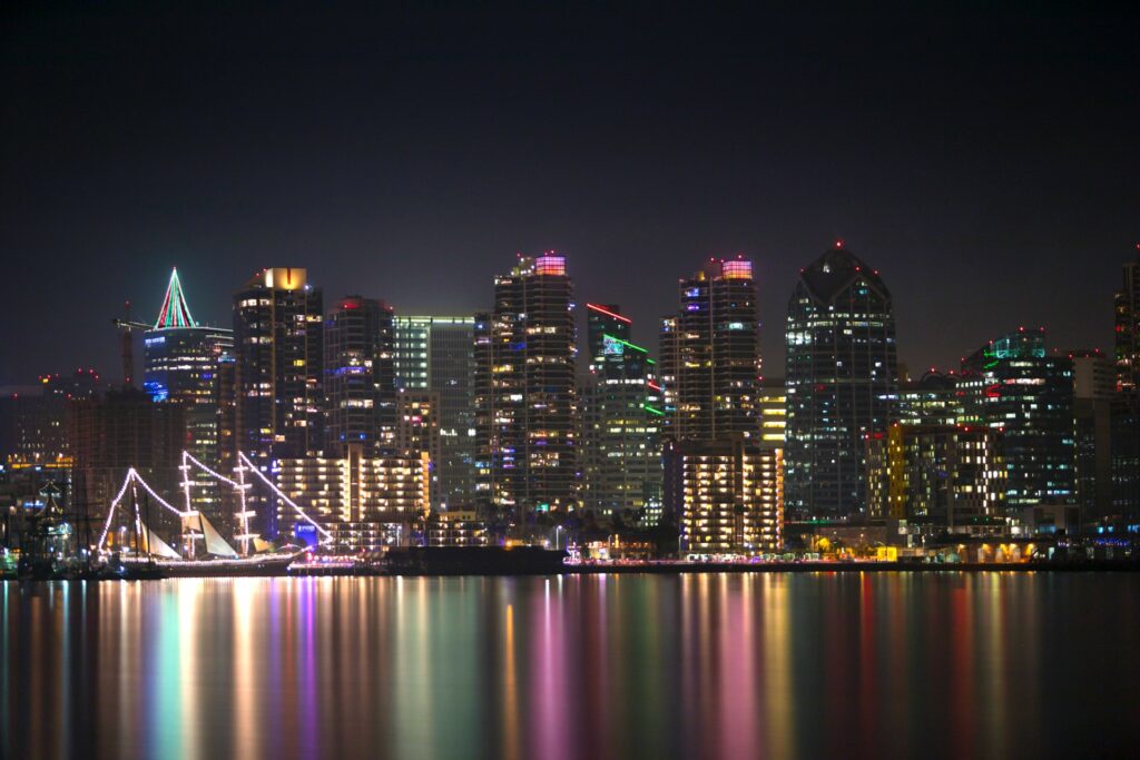 city skyline during night time
