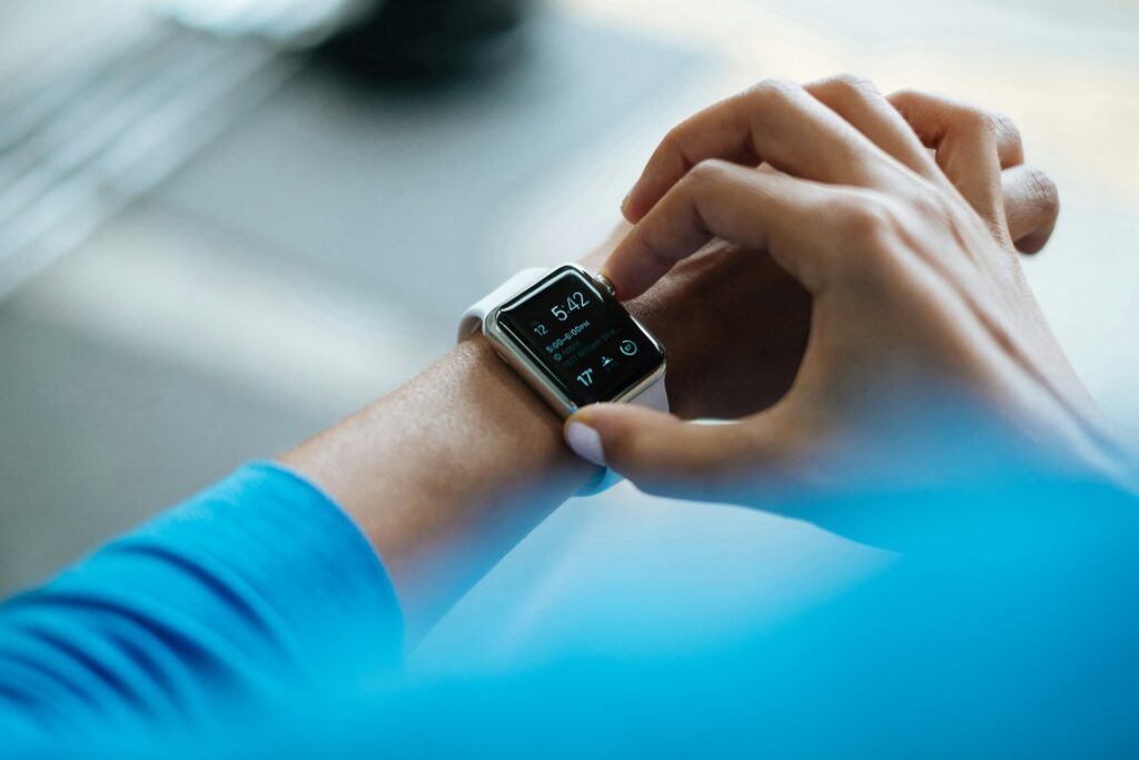 person clicking Apple Watch smartwatch
