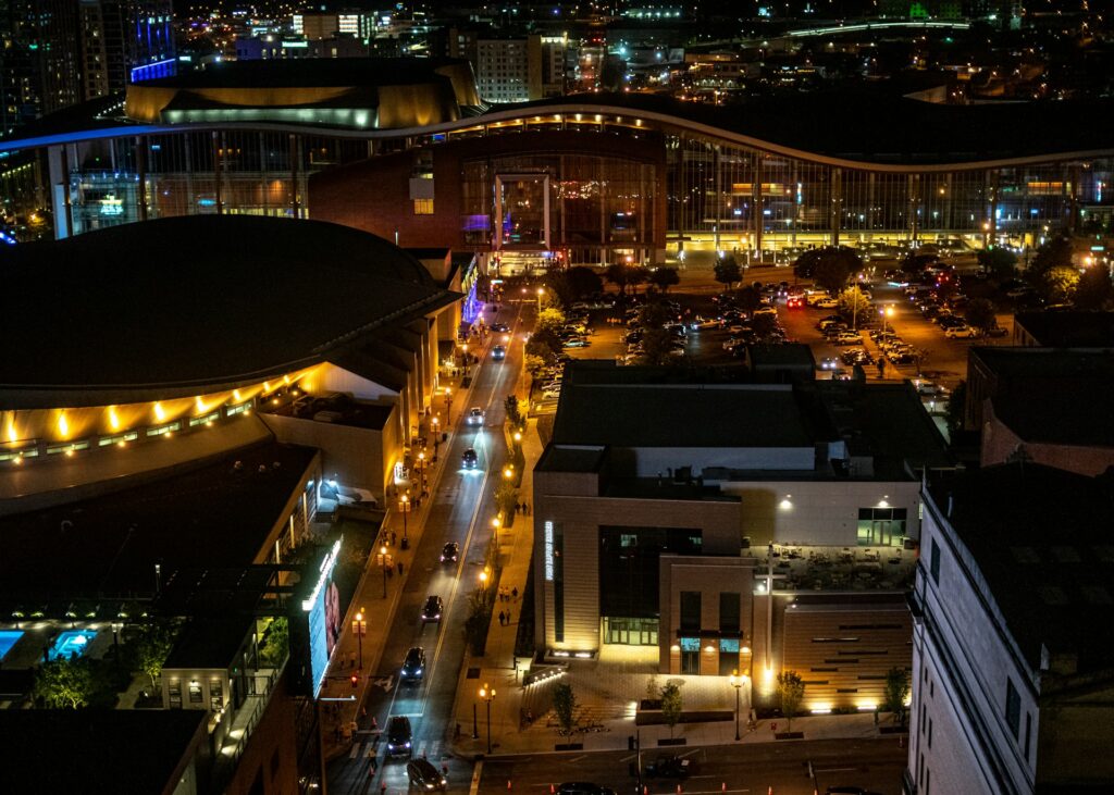 city with high rise buildings during night time
