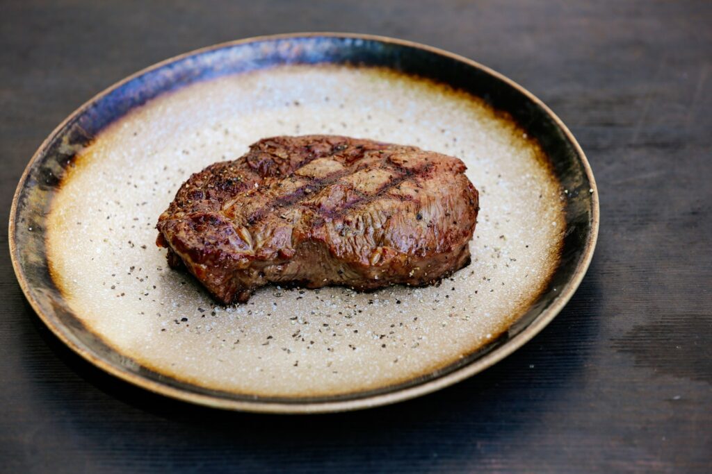 a piece of meat on a plate
