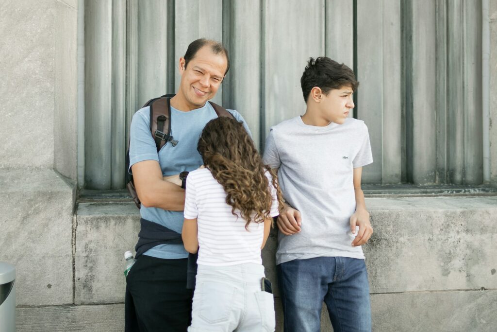 a man and woman with a child
