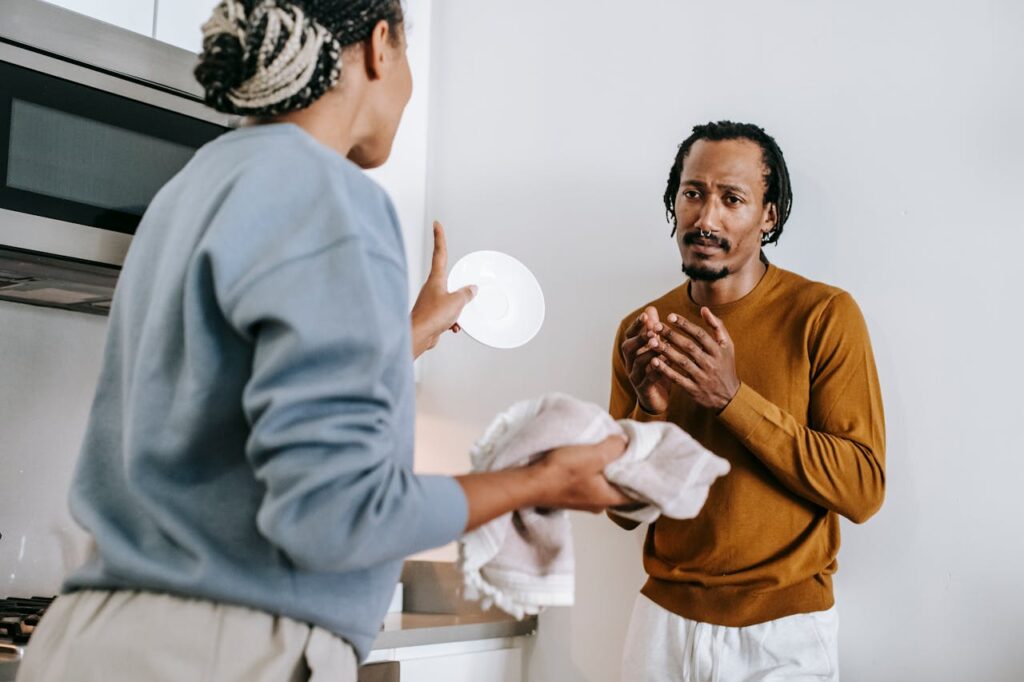 Black couple having conflict at home
