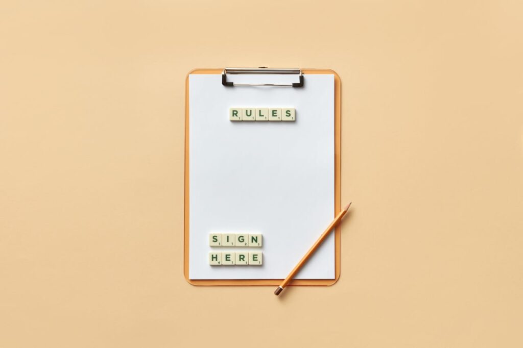 Pencil and Letter Tiles on a Clipboard
