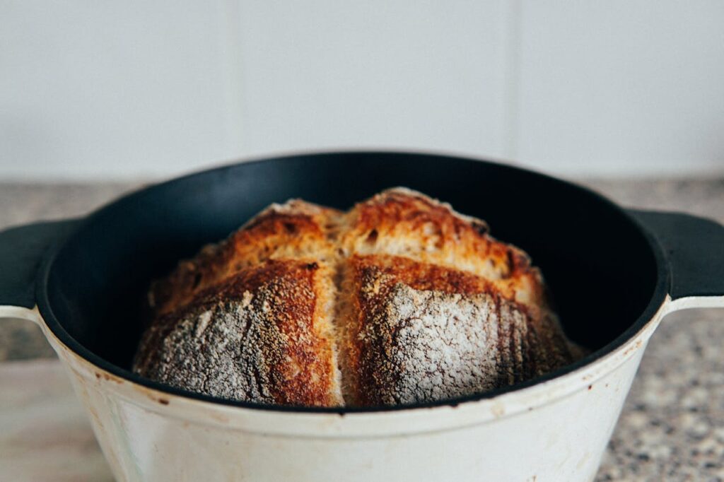 Fresh homemade baked bread in baking dish
