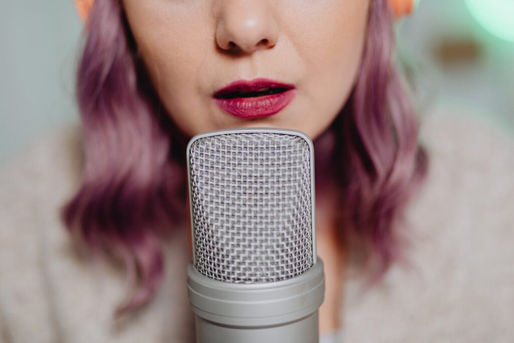 A Woman Talking on a Microphone