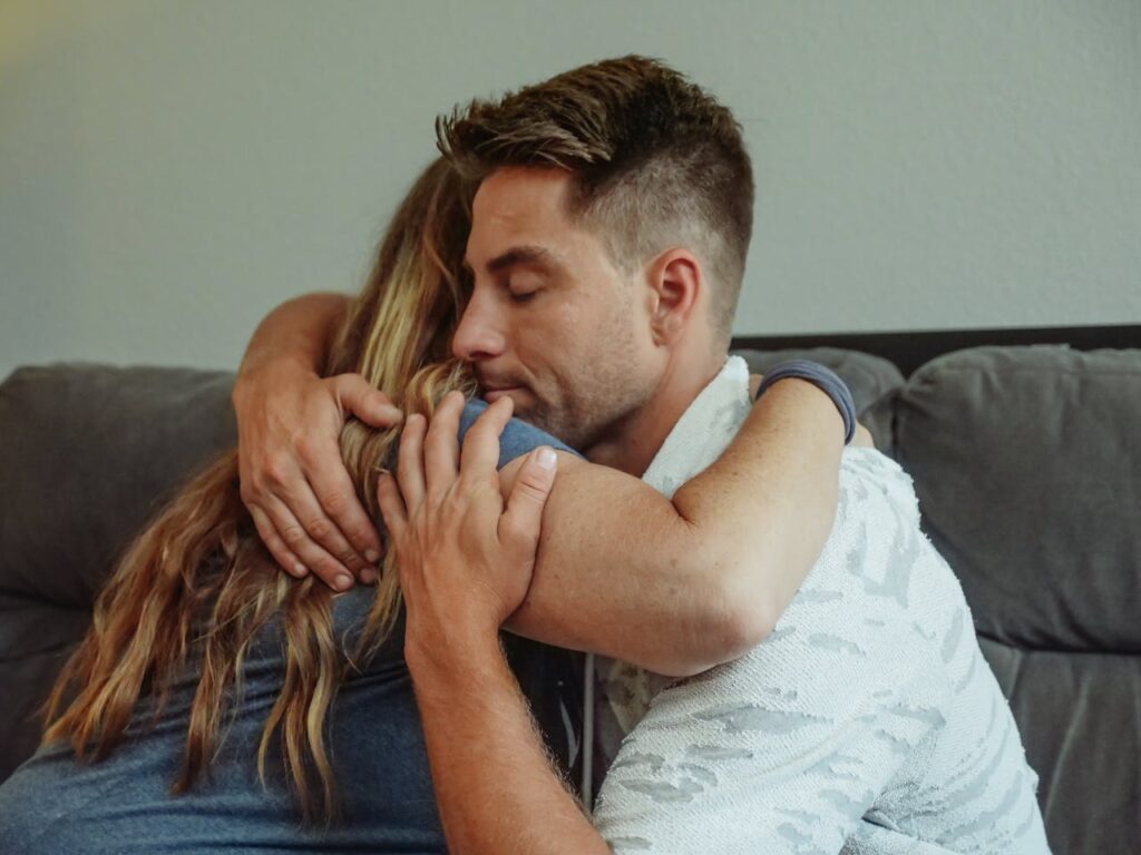Woman and Man Hugging
