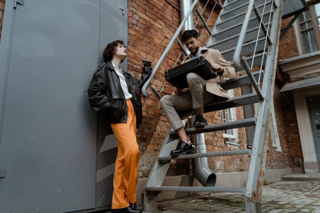 A Man Sitting on Stairs