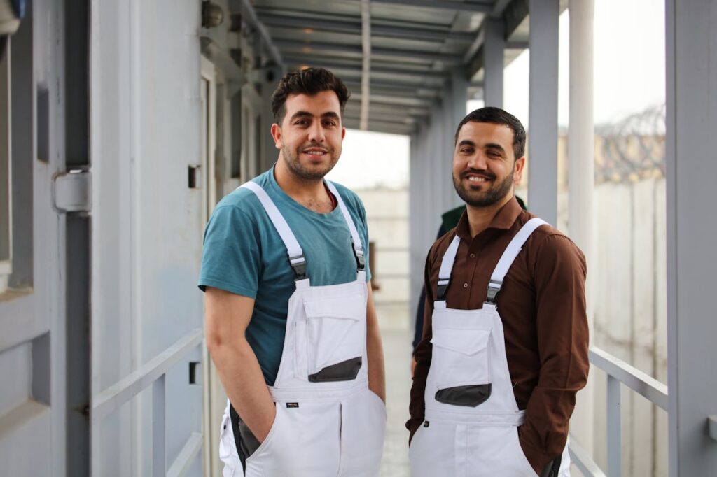 Men In White Dungarees
