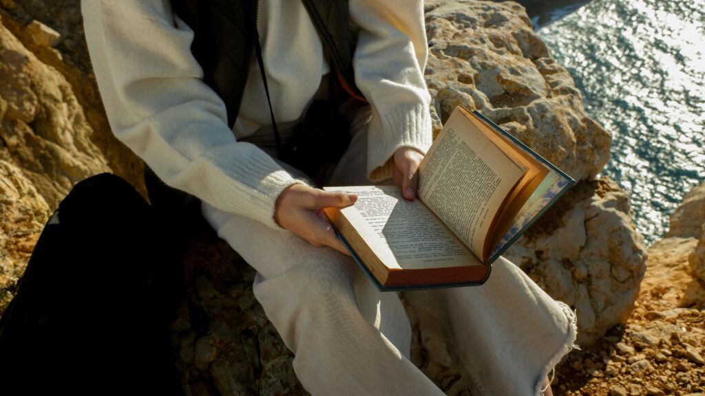 Person Holding a Book
