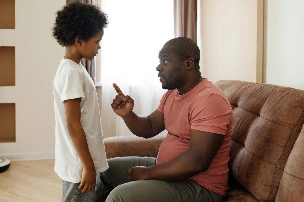 Father Disciplining Son