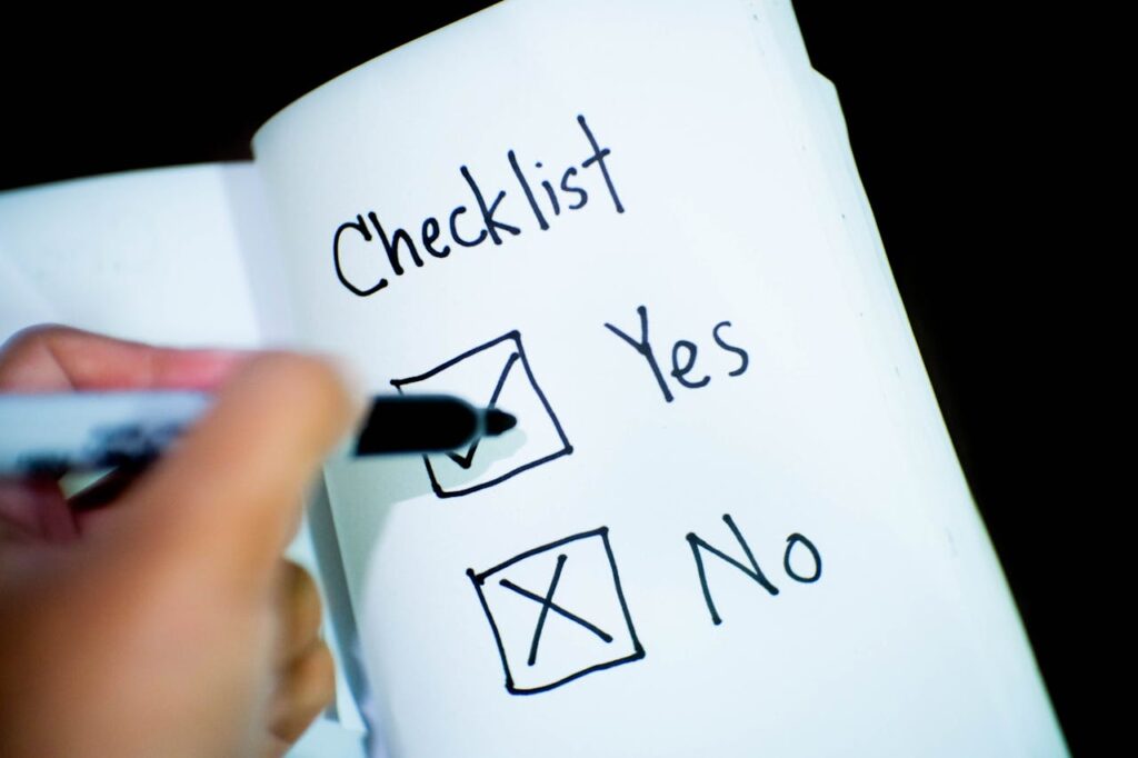 Person Marking Check on Opened Book
