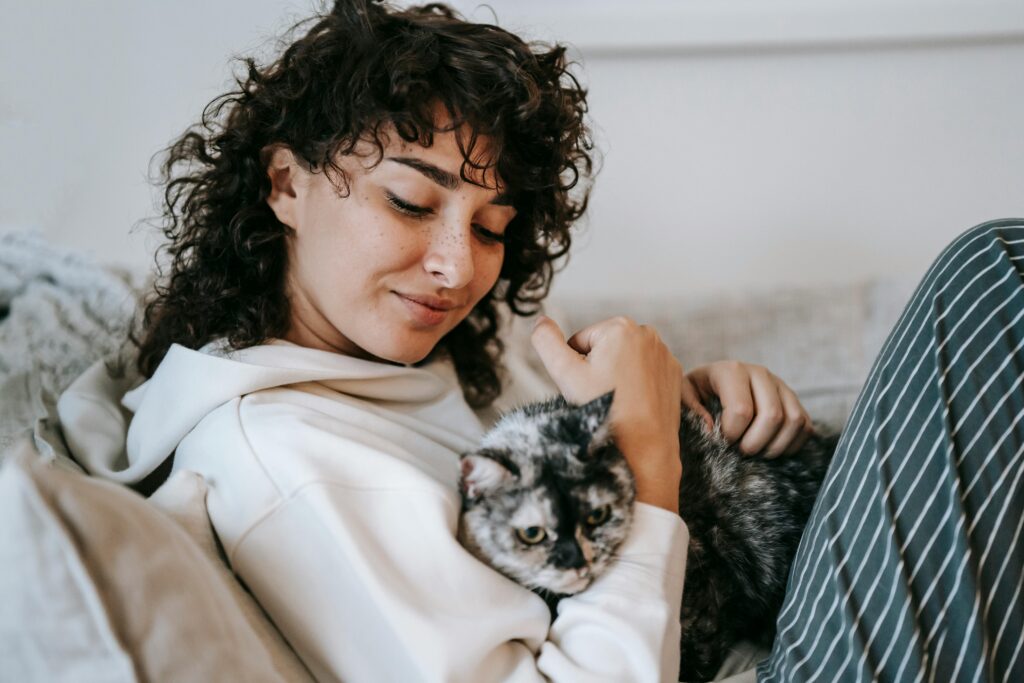 woman holding a cat