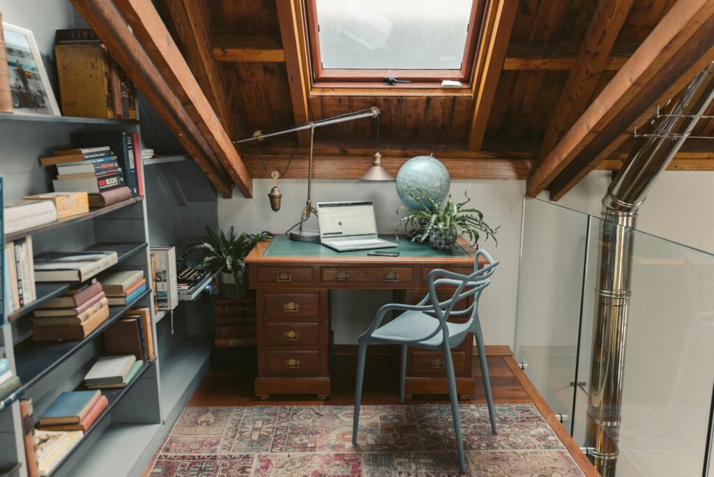 Silver Laptop Computer on Brown Wooden Desk
