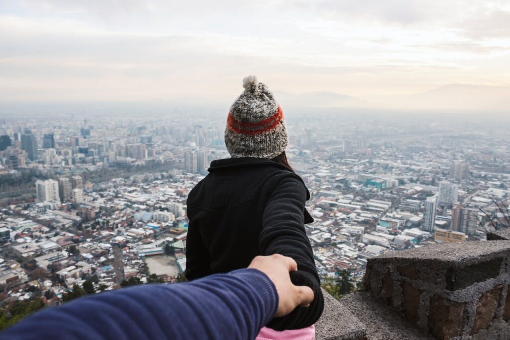 Man and Woman Holding Hands
