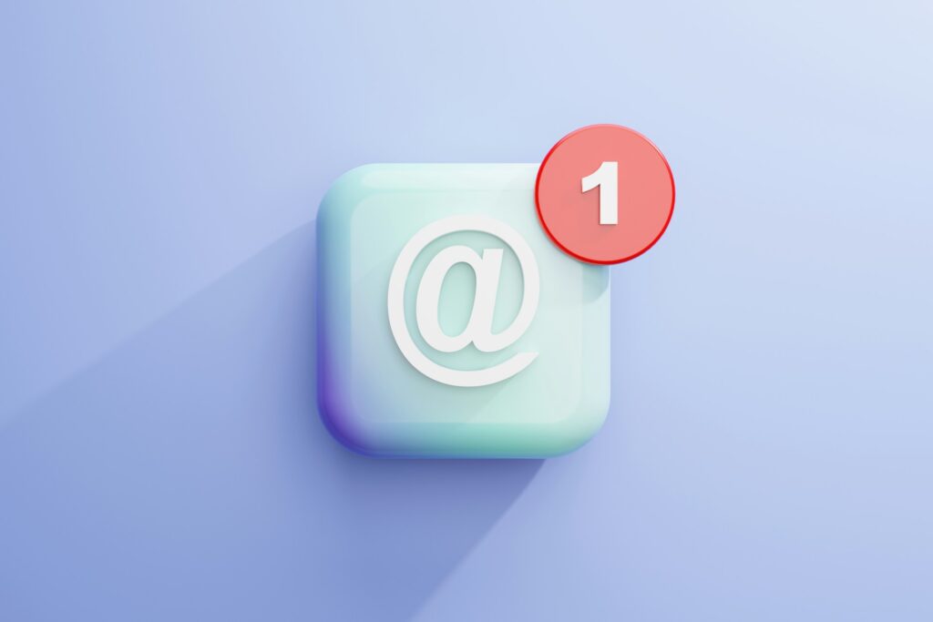 a white square with a red circle on top of it

