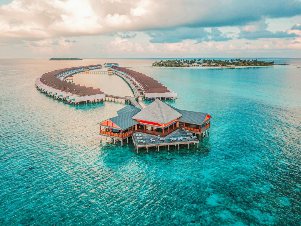 aerial photography of resort rooms and island
