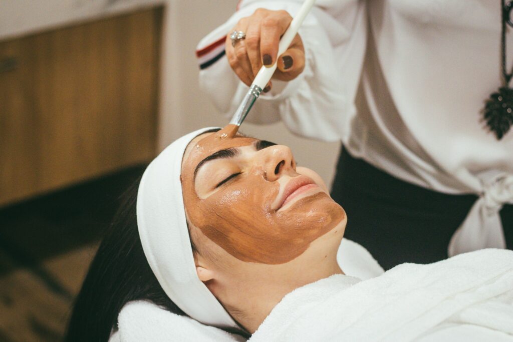 woman wearing mud mask
