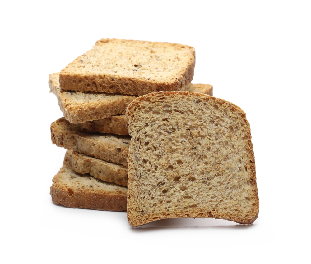Toast slices with seeds isolated on white background

