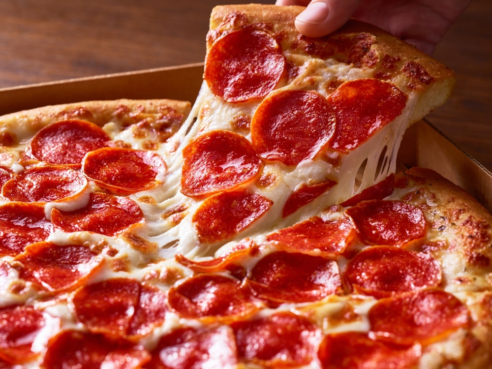 Delicious pepperoni pizza, sausage pizza, italian pepperoni pizza in pizzeria, italian food, pizza slice