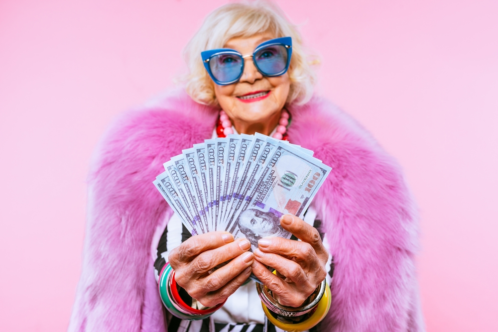 woman holding money