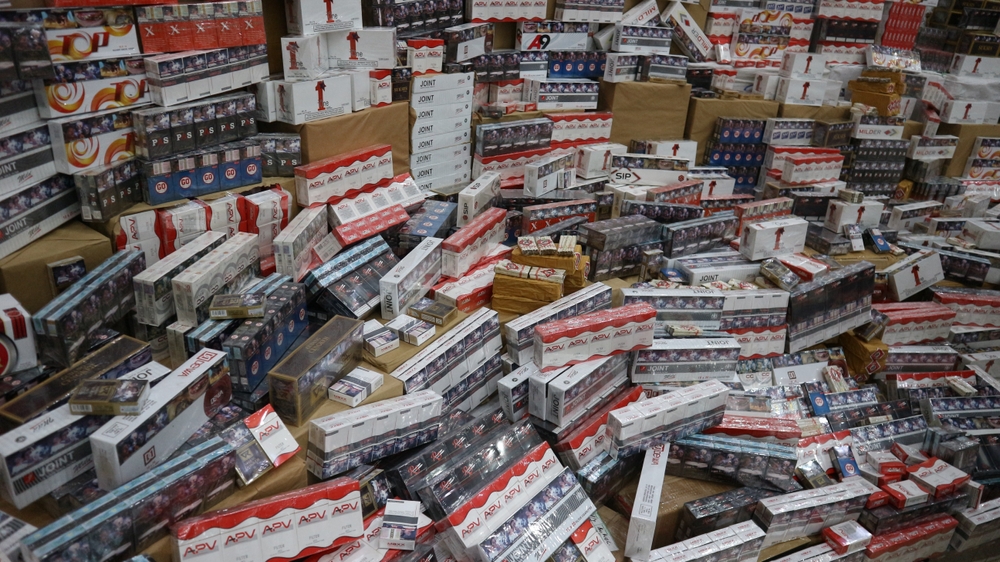 Sidoarjo, Indonesia - February 6, 2018: A collection of various brands of illegal cigarettes without excise that will be destroyed by customs
