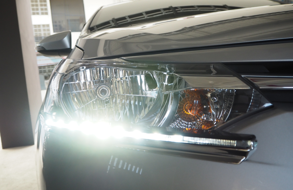 Daytime Running Light. Headlight LED daytime light for car. Lighting standards for cars and safety of motorists.
