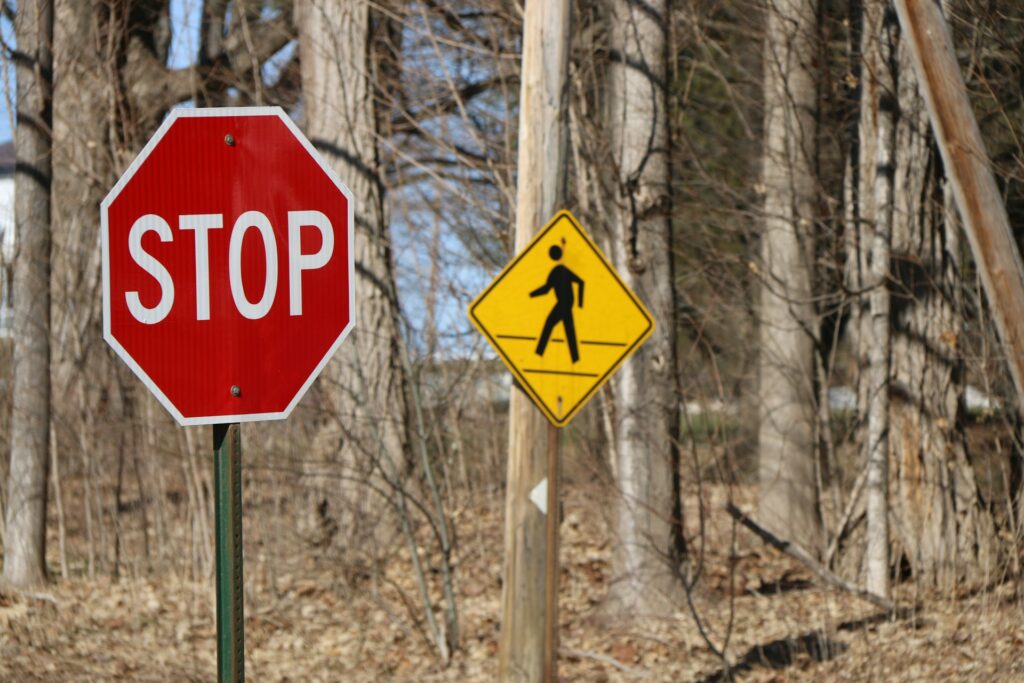 red and white stop road sign