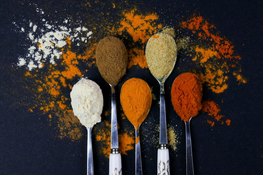 brown powder on silver spoon
