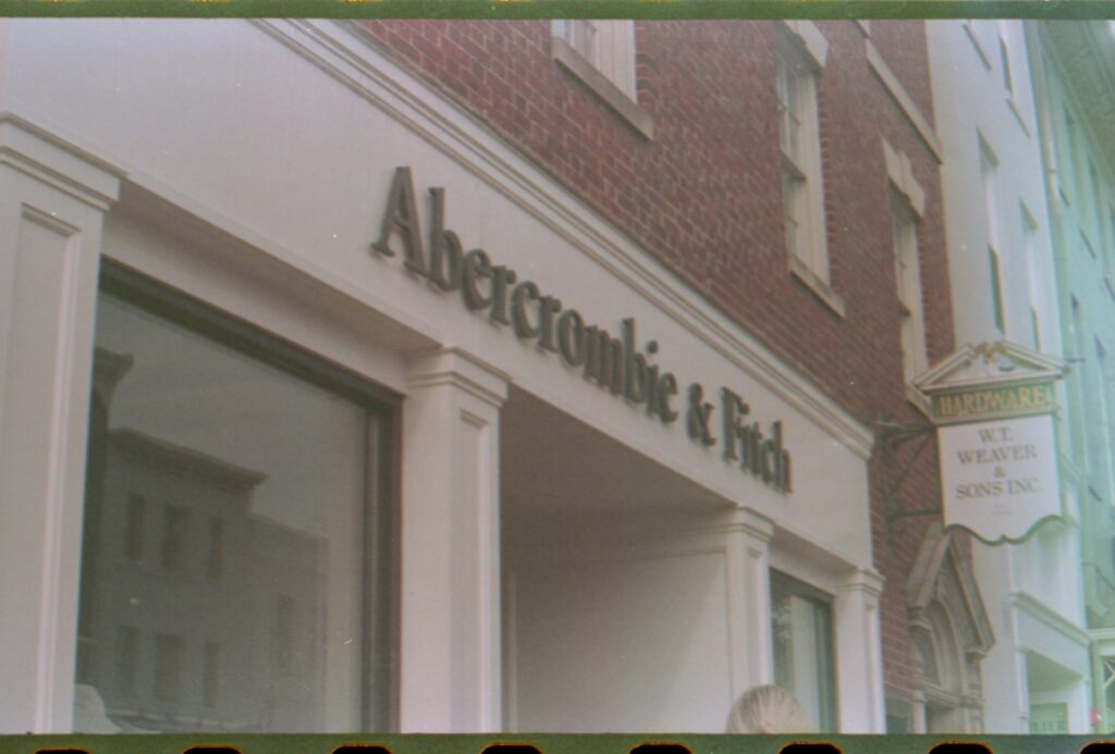 a building with a sign that says aberconiict & chik
