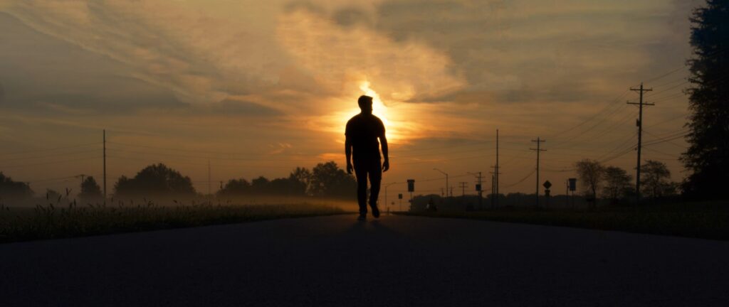 a person walking on a road
