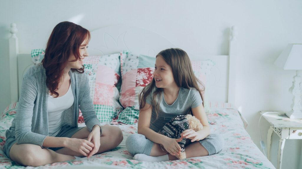 Mother and daughter are having a conversation.
