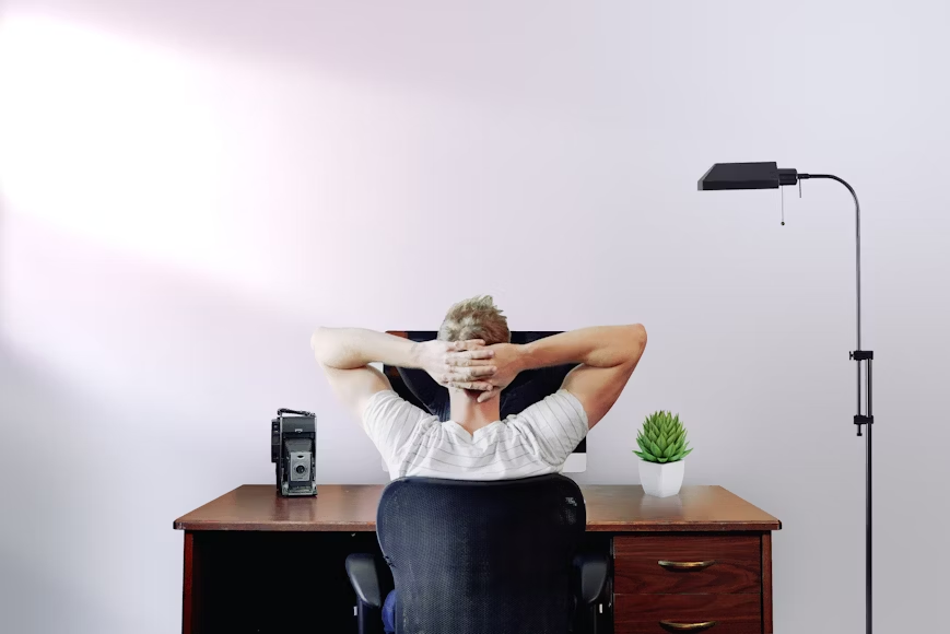 photograph of a person in their workspace