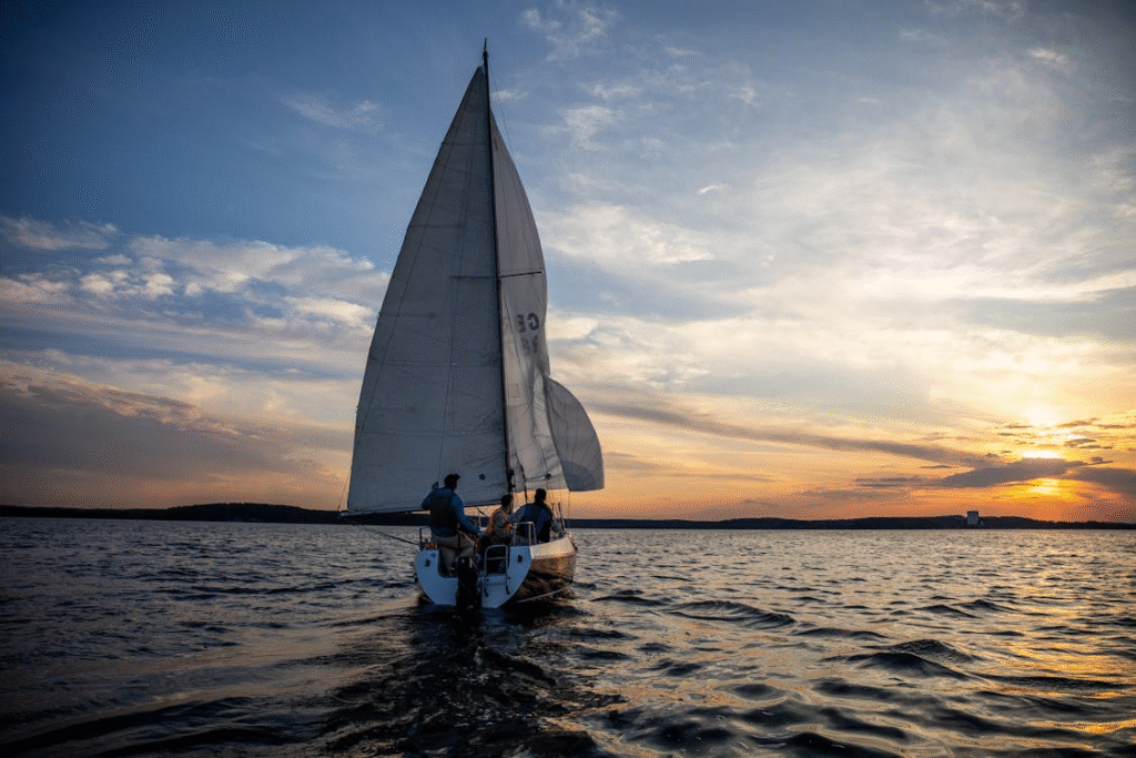 image of a sailboat in the middle of the ocean